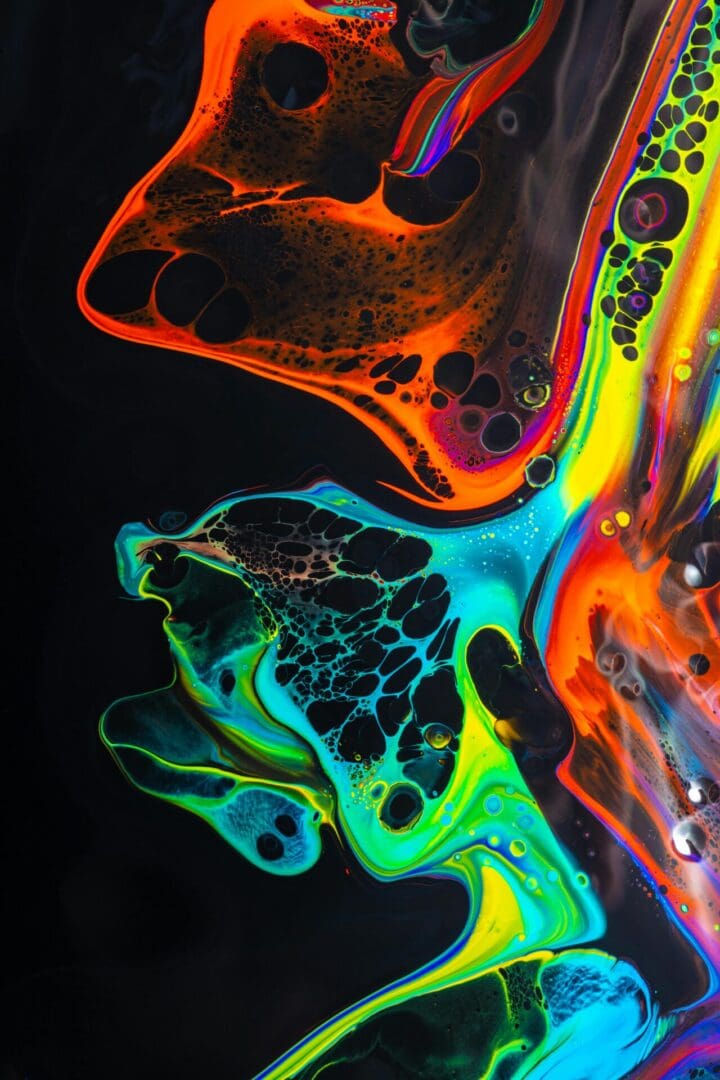 Vivid swirls of neon colors in a fluid art pattern.
