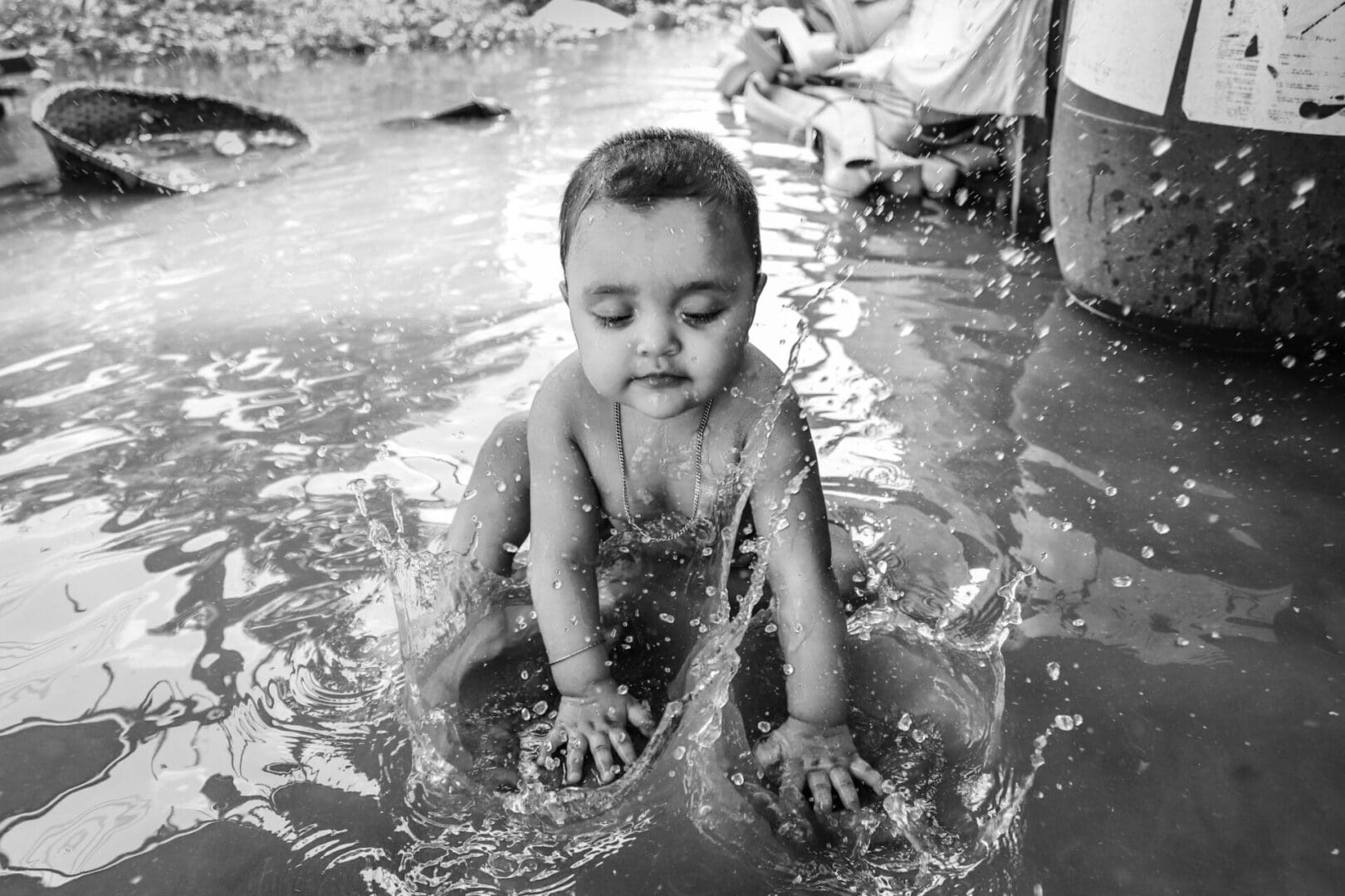 Babies must play in the water