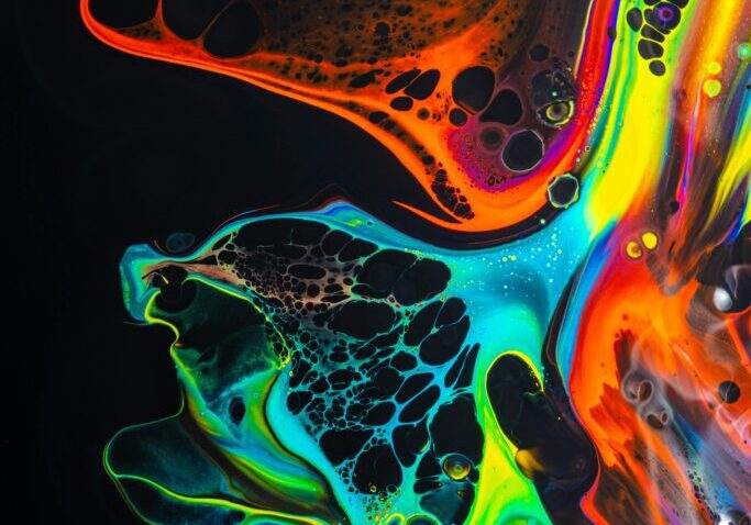 Vivid swirls of neon colors in a fluid art pattern.