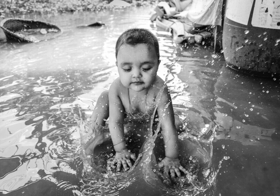 Babies must play in the water